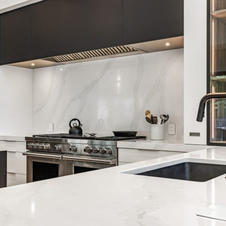 Hood Framed with Glass Front Cabinets