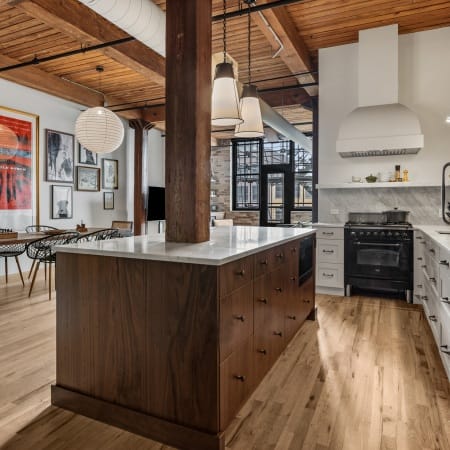 Exposed Beam Through the Island, Marble Countertop