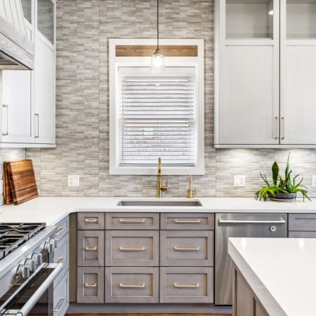 Upper Cabinets Extend to the Ceiling with Glass Fronts