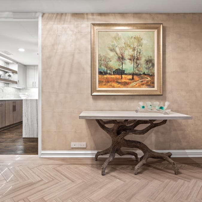 Foyer with Herringbone Plank Luxury Vinyl Tile