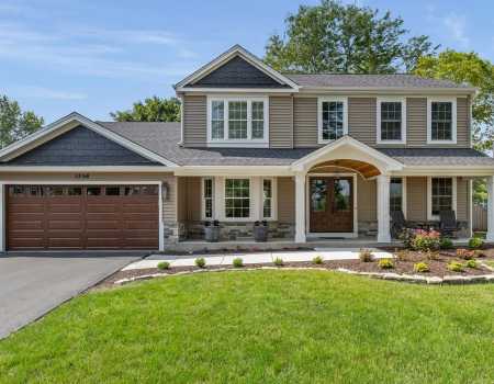 Craftsman Style Wooden Garage Door Stained in Rich Honey
