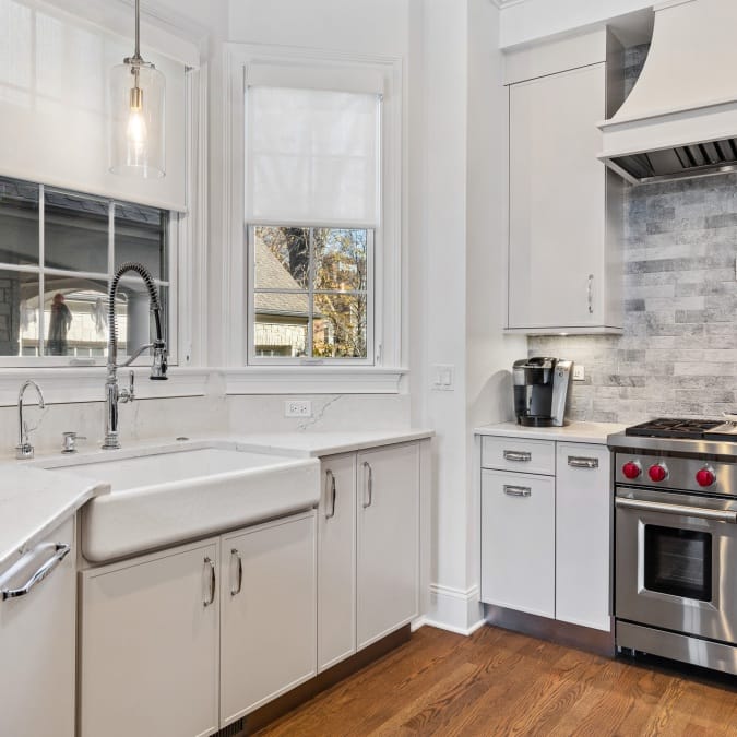 Farmhouse Sink with Stone Backsplash