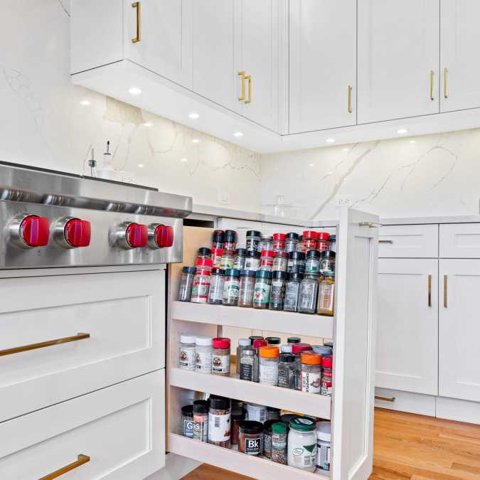 Slide out spice storage