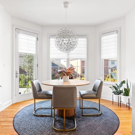 Breakfast Table Seating with Floor to Ceiling Windows