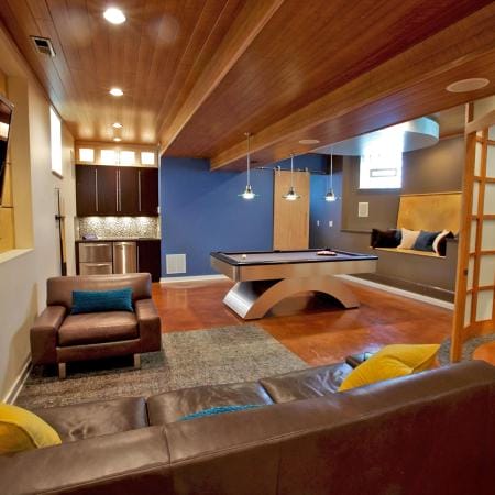 Mosaic Tile Backsplash in Wet Bar and Recessed Lighting in the Entertaining Space