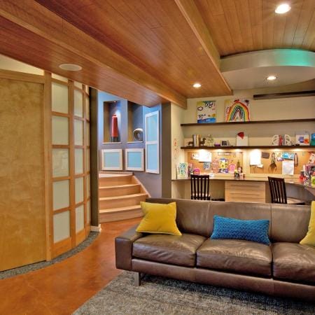 Wood Panel Ceiling and Rounded Powder Room