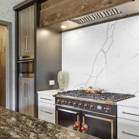 Quartz Backsplash and Granite Island Countertops