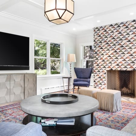 Cozy Living Room with Unique Light Fixture