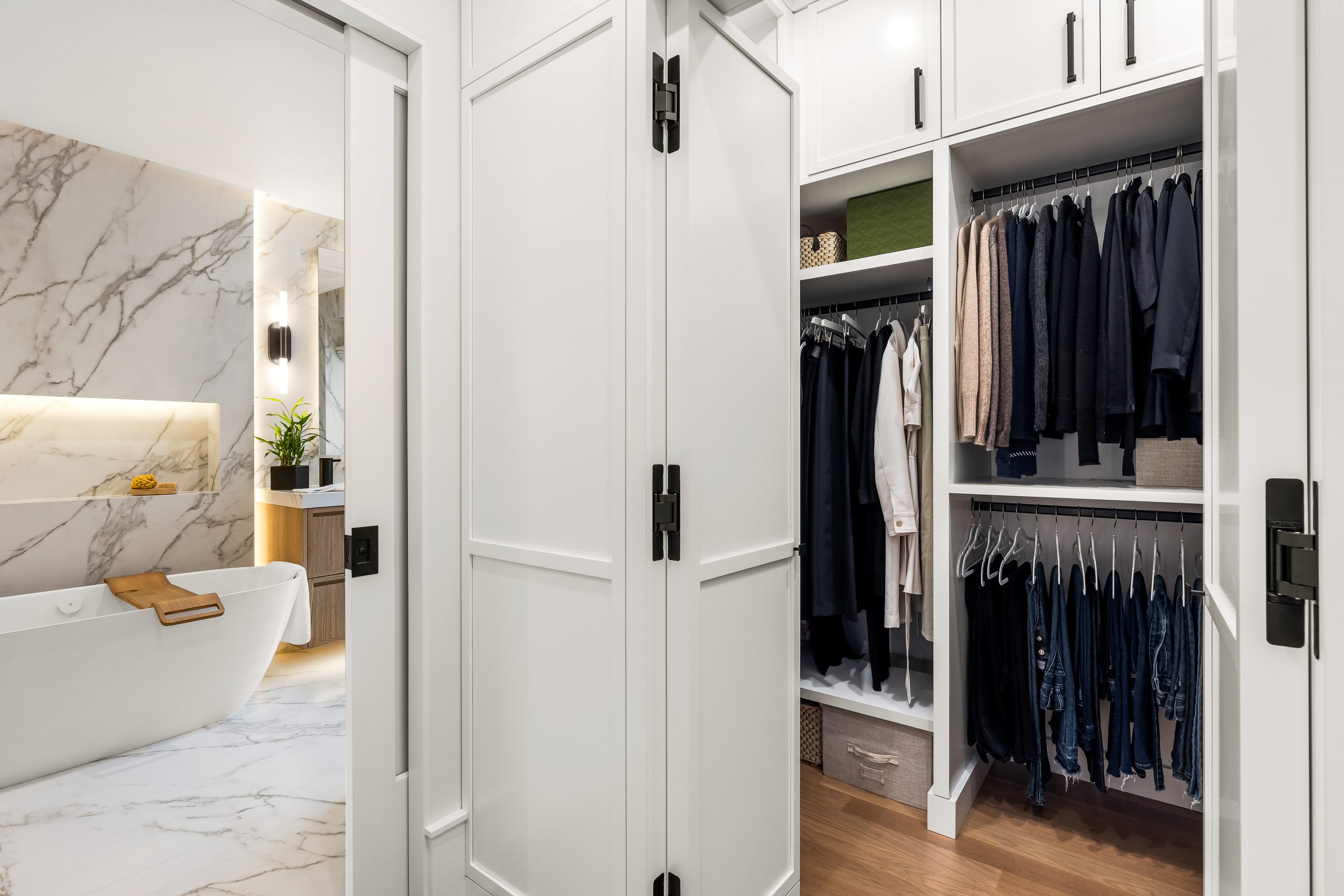 Primary suite remodel with walk-in closet and large bathroom.